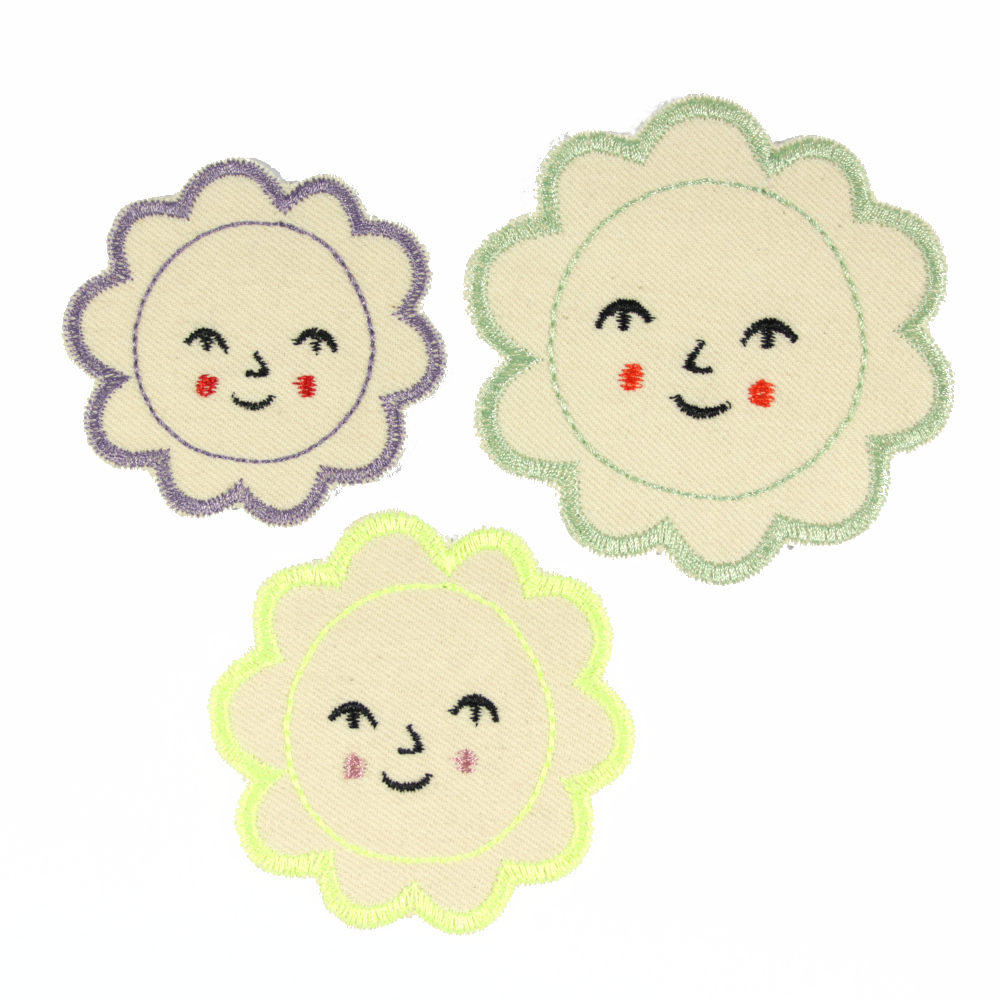 Flower patches to iron on in a set of 3 blossom iron-on images with a friendly face
