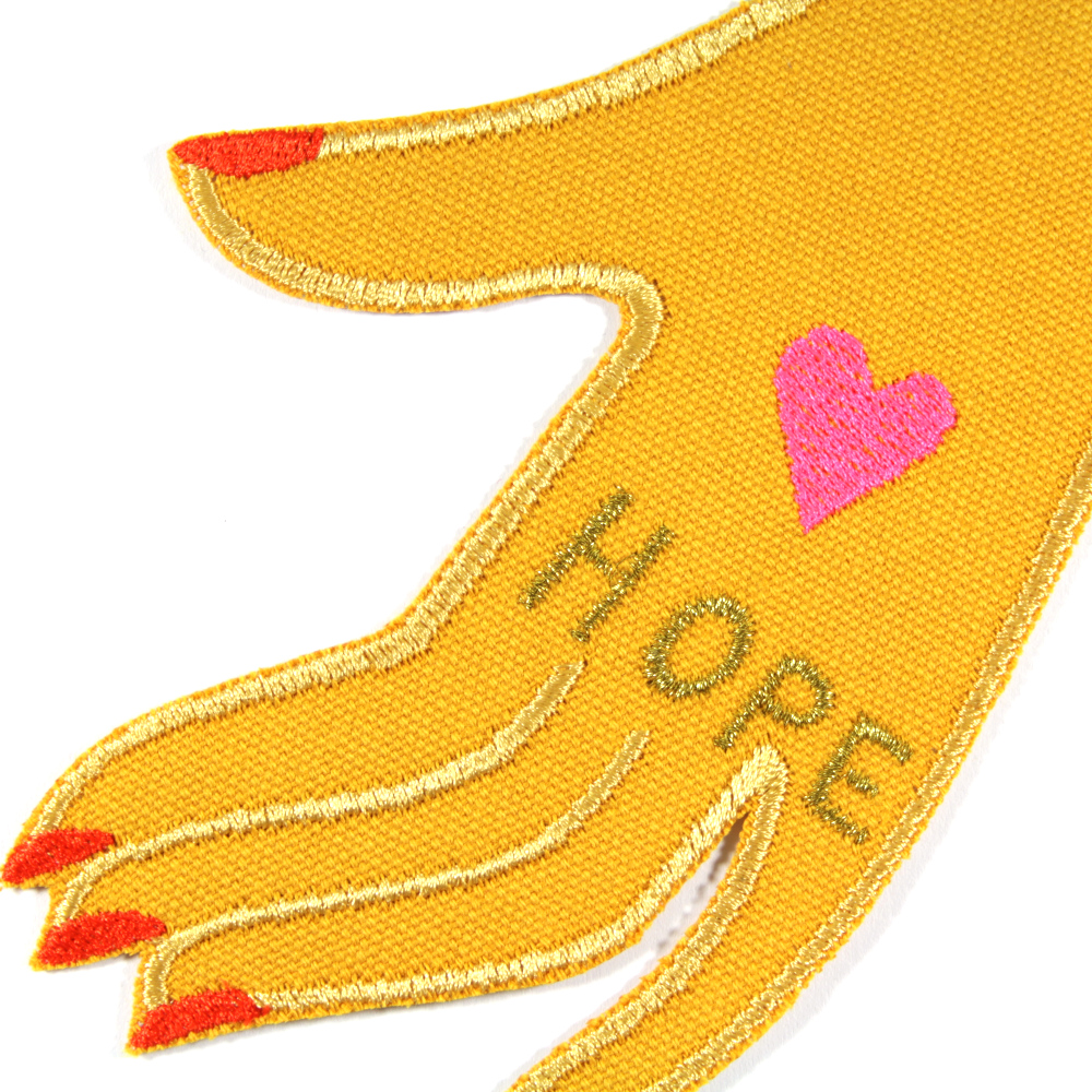 Patch Hand "HOPE" großes Bügelbild gold und neon pink gestickt auf gelbem Bio Canvas für Erwachsene