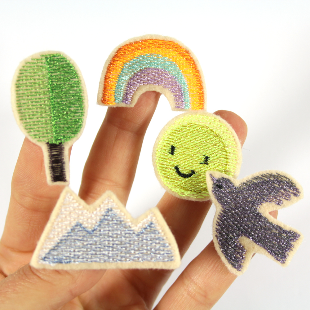 Iron-on patches rainbow, tree, sun, bird and mountains in a set of 5 small glitter patches